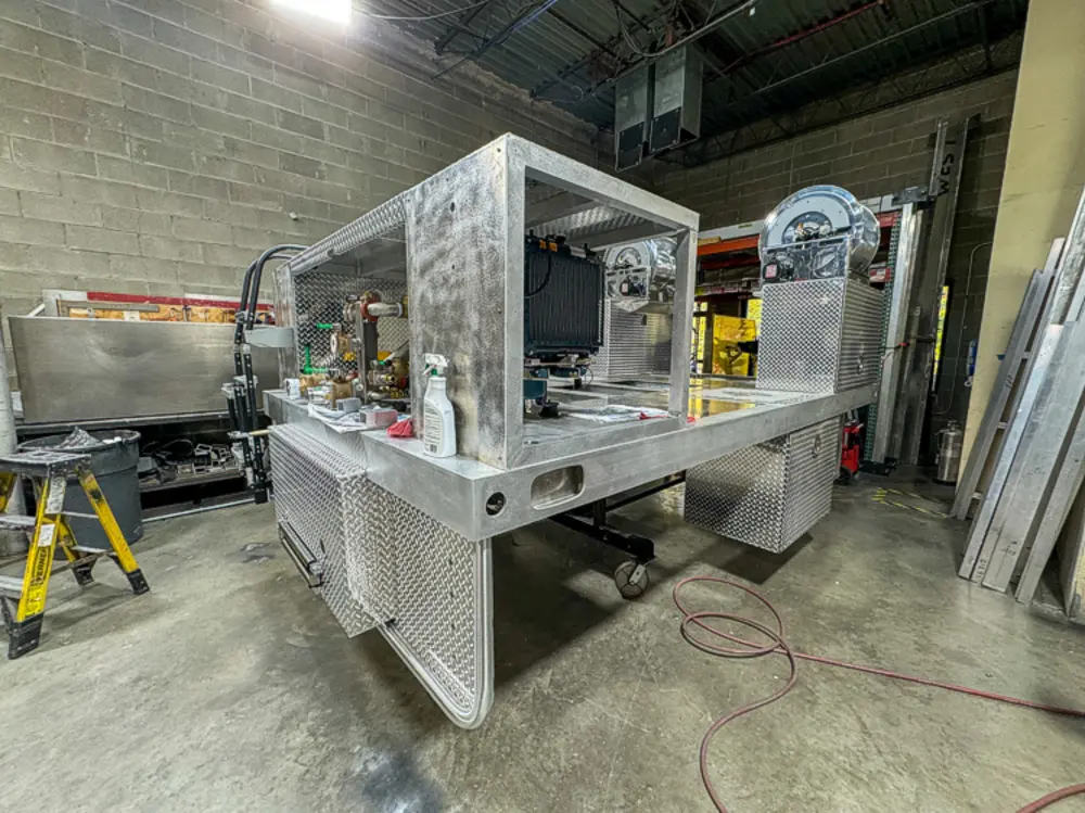 Pump and plumbing components during installation, photo 143 of 303.